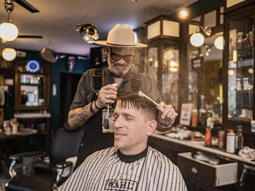 A classic barbershop scene with a barber styling a customer's hair, capturing nostalgic grooming moments.